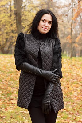 Woman in black quilted jacket
