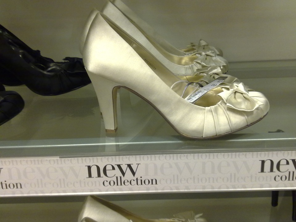 white silk heels on store shelf