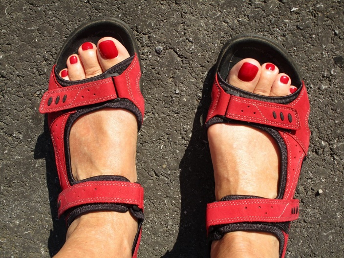 closeup of womans feet in sandals