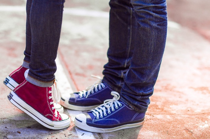 Couple with converse shoes on