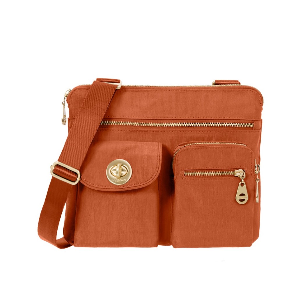 Orange Crossbody tote with gold zippers